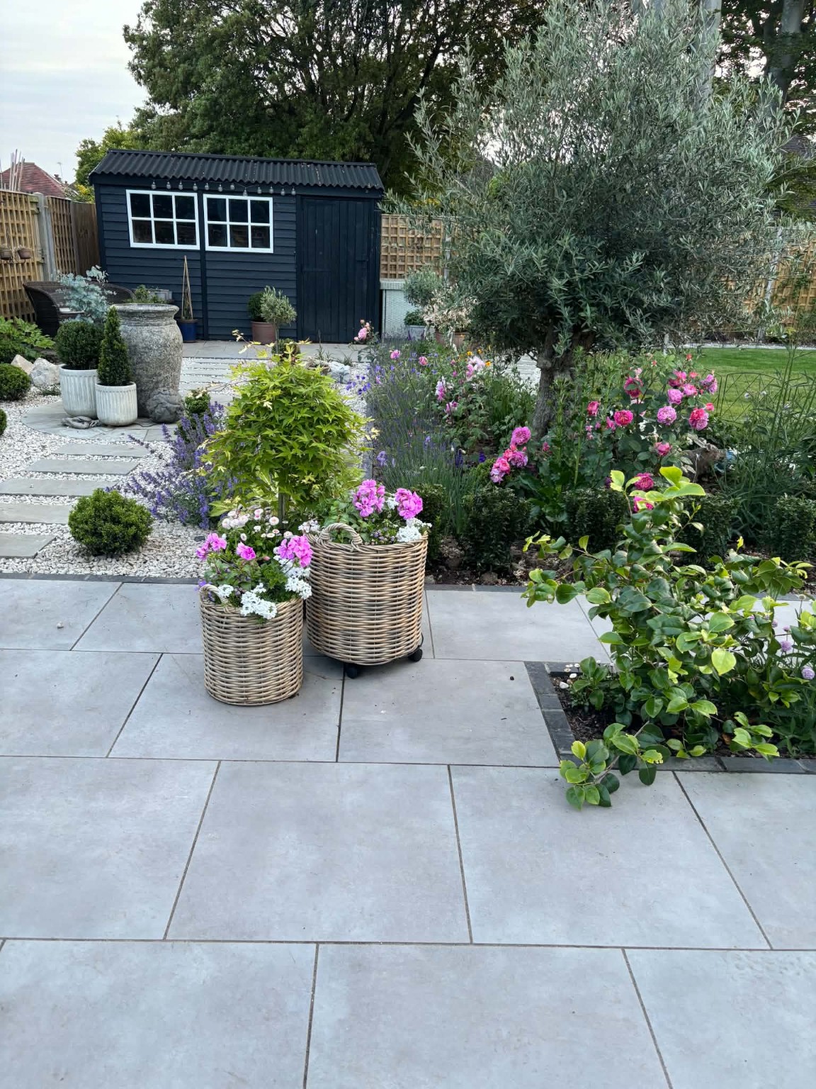 Porcelain patio and landscaped garden